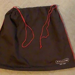 Coach purse with dust cover